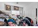 Bedroom filled with items near a window, featuring a closet with sliding doors at 2804 Gallant Hills Dr, Las Vegas, NV 89135