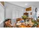 Bright dining room featuring a wooden table, chairs and window with natural light at 2804 Gallant Hills Dr, Las Vegas, NV 89135
