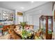 Bright dining room featuring a wooden table, chairs and window with natural light at 2804 Gallant Hills Dr, Las Vegas, NV 89135