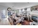 Cozy living room featuring a fireplace and comfortable furnishings at 2804 Gallant Hills Dr, Las Vegas, NV 89135