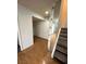 Hallway and staircase with mirrored wall at 2818 Calle Del Oro, Las Vegas, NV 89120