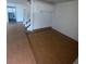 Living room looking towards kitchen and staircase at 2818 Calle Del Oro, Las Vegas, NV 89120