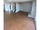 Living room and staircase with a view of the kitchen and a fireplace at 2818 Calle Del Oro, Las Vegas, NV 89120