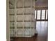 Living room with built-in shelving units, offering stylish storage and a cozy atmosphere at 2818 Calle Del Oro, Las Vegas, NV 89120