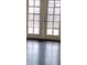 Double patio doors open onto a balcony or deck, enhancing the living space and natural light in the room at 2818 Calle Del Oro, Las Vegas, NV 89120