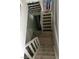 Staircase leading to lower level, offering access to additional living space or storage areas in the home at 2818 Calle Del Oro, Las Vegas, NV 89120