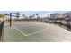 Outdoor basketball court features manicured landscaping and palm trees in a well-maintained community at 2846 Cerulean Stars Ln # 1, Las Vegas, NV 89183