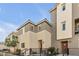 Charming townhome featuring a two-story design, neutral color palette, and inviting entryway at 2846 Cerulean Stars Ln # 1, Las Vegas, NV 89183