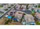 Aerial view showcasing a luxury home, manicured landscaping, and private pool at 2908 Ferrand Ct, Henderson, NV 89044