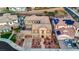Expansive aerial view of a two-story home showcasing its spacious driveway and landscaping at 2908 Ferrand Ct, Henderson, NV 89044