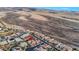 Desert community aerial view showcasing the home's location near the hills, residential area, and the overall landscape at 2908 Ferrand Ct, Henderson, NV 89044