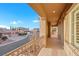 Exterior balcony showcasing the street with other houses and offering a picturesque neighborhood view at 2908 Ferrand Ct, Henderson, NV 89044