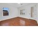 Bedroom features hardwood floors, natural light, and a door that leads to outdoor access at 2908 Ferrand Ct, Henderson, NV 89044