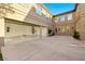 Spacious three-car garage with epoxy floors, ample storage, and access to the backyard at 2908 Ferrand Ct, Henderson, NV 89044