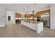 Spacious kitchen features granite countertops, stainless steel appliances, and custom cabinetry at 2908 Ferrand Ct, Henderson, NV 89044