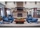 Inviting lobby featuring a stone fireplace, high ceilings, ample seating and large windows for natural light at 2908 Ferrand Ct, Henderson, NV 89044