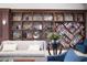 Attractive community lobby with custom built-ins, stone fireplace, comfortable couches and nice decor at 2908 Ferrand Ct, Henderson, NV 89044