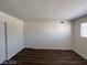 Bright bedroom features hardwood floors, a closet, and a window for plenty of natural light at 2916 Karen Ave, Las Vegas, NV 89121