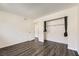 Bedroom features wood-look flooring, closet and white walls at 2916 Karen Ave, Las Vegas, NV 89121