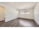 Bedroom features wood-look flooring, closet and dual windows at 2916 Karen Ave, Las Vegas, NV 89121