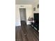 Cozy living room with hardwood floors, neutral walls, and easy access to other areas at 2916 Karen Ave, Las Vegas, NV 89121