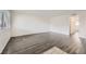 Spacious living room with stylish wood-look flooring and an abundance of natural light at 2916 Karen Ave, Las Vegas, NV 89121