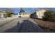 Charming single-story home with a long driveway and low-maintenance landscaping at 301 Falcon Ln, Las Vegas, NV 89107