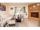 Comfortable living room with sliding doors to the backyard at 301 Falcon Ln, Las Vegas, NV 89107