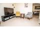Inviting living room showcasing tile floors and stylish furnishings at 301 Falcon Ln, Las Vegas, NV 89107