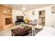 Cozy living area features a decorative fireplace and tile floors at 301 Falcon Ln, Las Vegas, NV 89107