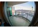 Spacious outdoor balcony boasting beautiful city views and a sleek glass railing at 322 Karen Ave # 3407, Las Vegas, NV 89109