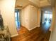 Hallway with hardwood floors leading to rooms with city views through large windows at 322 Karen Ave # 3407, Las Vegas, NV 89109