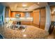 Well-equipped kitchen featuring granite countertops, stainless steel appliances, and sleek cabinetry at 322 Karen Ave # 3407, Las Vegas, NV 89109