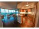 Open floor plan with modern kitchen, breakfast bar, and expansive city views at 322 Karen Ave # 3407, Las Vegas, NV 89109