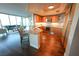 Modern kitchen with stainless steel appliances, granite countertops, and dark wood flooring at 322 Karen Ave # 3407, Las Vegas, NV 89109
