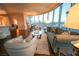 This living room features floor to ceiling curved windows with an amazing view of the city below at 322 Karen Ave # 3407, Las Vegas, NV 89109
