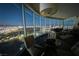 Stunning living room with floor-to-ceiling windows showcasing panoramic city views at night at 322 Karen Ave # 3407, Las Vegas, NV 89109