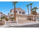 Inviting two-story home with desert landscaping, a two-car garage, and a well-maintained front yard at 3609 Twinbreeze St, Las Vegas, NV 89129