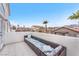 Outdoor living space featuring wicker sofa with bright patterned cushions and mountain views at 3609 Twinbreeze St, Las Vegas, NV 89129