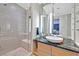 Stylish bathroom featuring marble countertops, vessel sink, glass shower, and modern fixtures at 3722 Las Vegas Blvd # 2001, Las Vegas, NV 89158