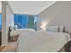 Serene bedroom featuring two beds, plush carpets, and expansive windows with city views at 3722 Las Vegas Blvd # 2001, Las Vegas, NV 89158