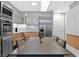 Bright kitchen and dining area showcasing built-in stainless steel appliances and ample storage at 3722 Las Vegas Blvd # 2001, Las Vegas, NV 89158