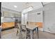 Clean kitchen features stainless steel appliances, granite countertops, and dining area at 3722 Las Vegas Blvd # 2001, Las Vegas, NV 89158