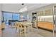 Modern living and dining area with a view, featuring an open kitchen and city view, perfect for urban living at 3722 Las Vegas Blvd # 2001, Las Vegas, NV 89158