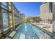 Bright, stylish rooftop pool area with lounge chairs and an open view at 3722 Las Vegas Blvd # 2001, Las Vegas, NV 89158