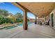 Inviting covered back patio featuring a pool and spa, perfect for outdoor relaxation and entertaining at 3723 Robin Knot Ct, North Las Vegas, NV 89084