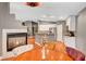 Cozy dining area with a fireplace, seamlessly flowing into a modern kitchen, ideal for Gathering gatherings at 3723 Robin Knot Ct, North Las Vegas, NV 89084