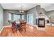 Charming dining area with a fireplace and bay window, creating a warm and inviting space for meals at 3723 Robin Knot Ct, North Las Vegas, NV 89084