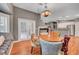 Cozy dining area with fireplace and window bench is bathed in natural light at 3723 Robin Knot Ct, North Las Vegas, NV 89084