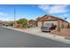 Charming single-story home with a three-car garage, well-maintained landscaping, and inviting curb appeal at 3723 Robin Knot Ct, North Las Vegas, NV 89084